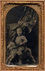 Young Boy on Hobby Horse with a draped person hidden behind him, c. 1867